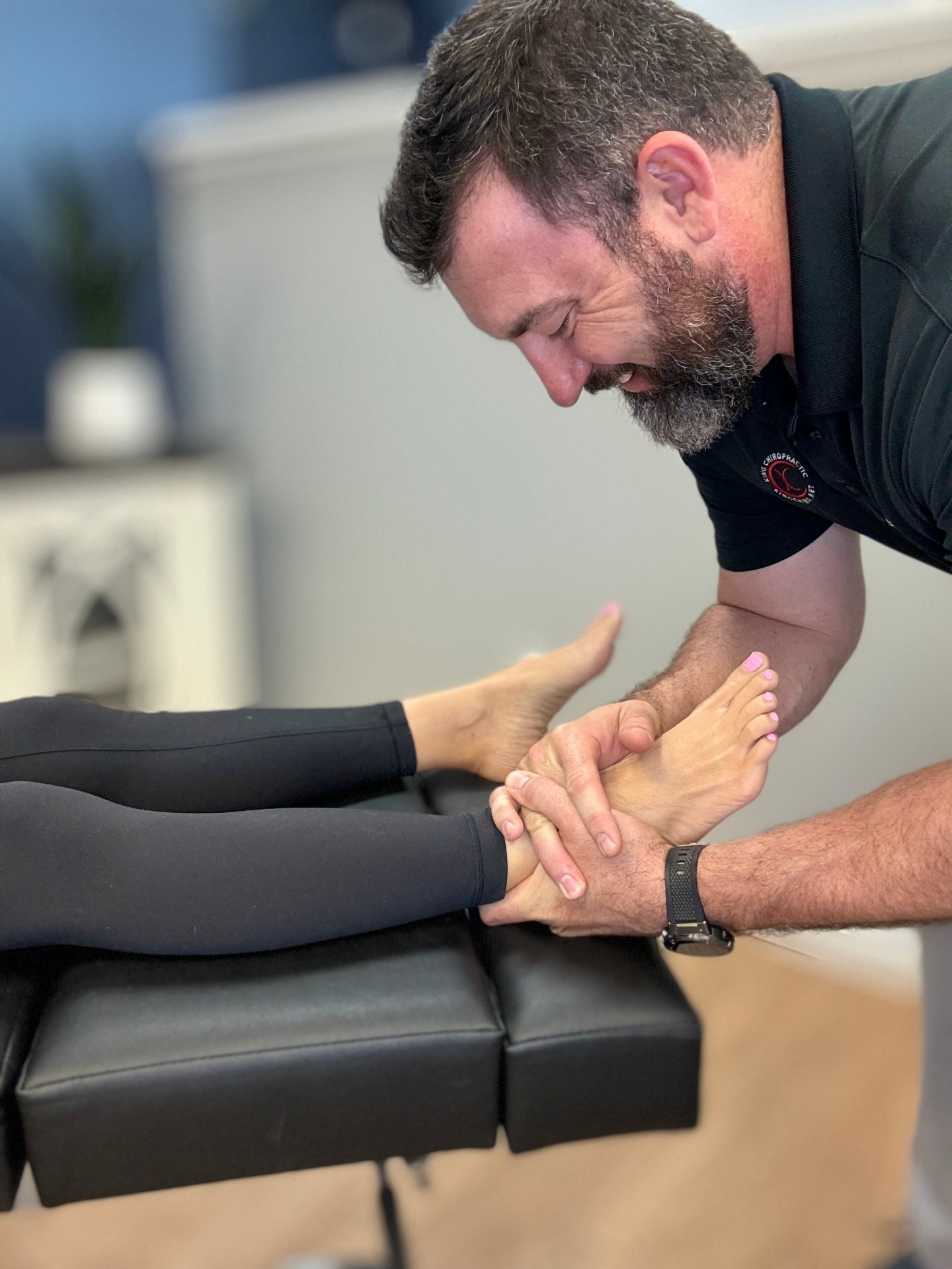 Dr. King working on a patient's foot