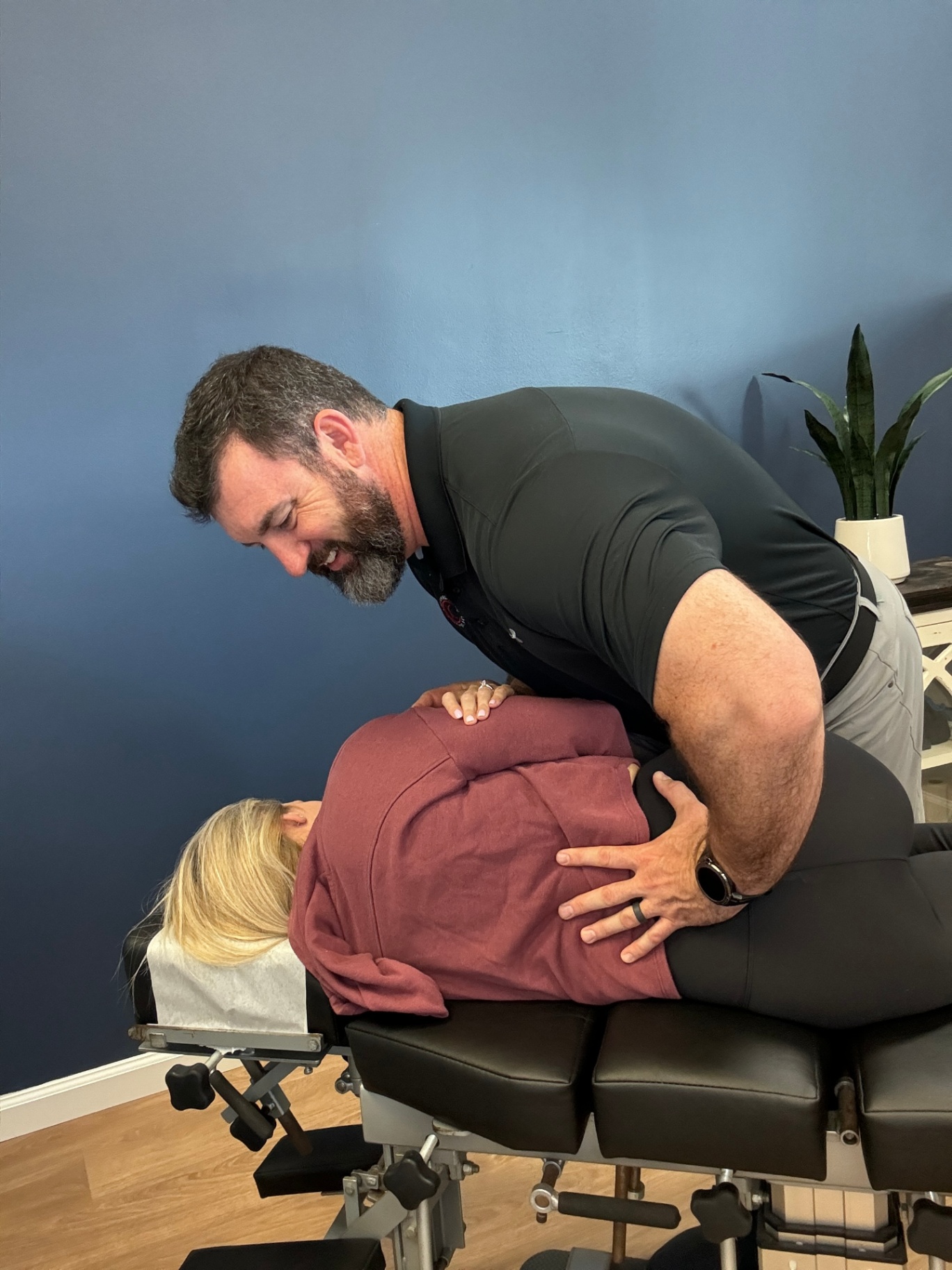 Dr. King performing a spinal adjustment