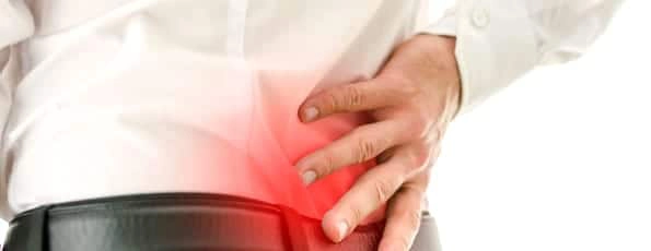 Chiropractic Wilmington NC Working Man With Back Pain