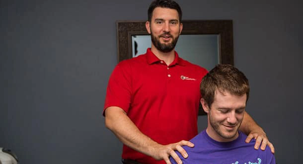 Chiropractor Wilmington NC Rhett King Adjusting Shoulders